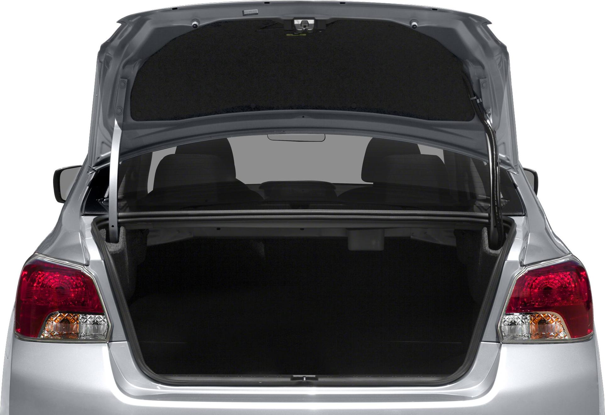 Open trunk of a sedan showing spacious cargo space and rear lights