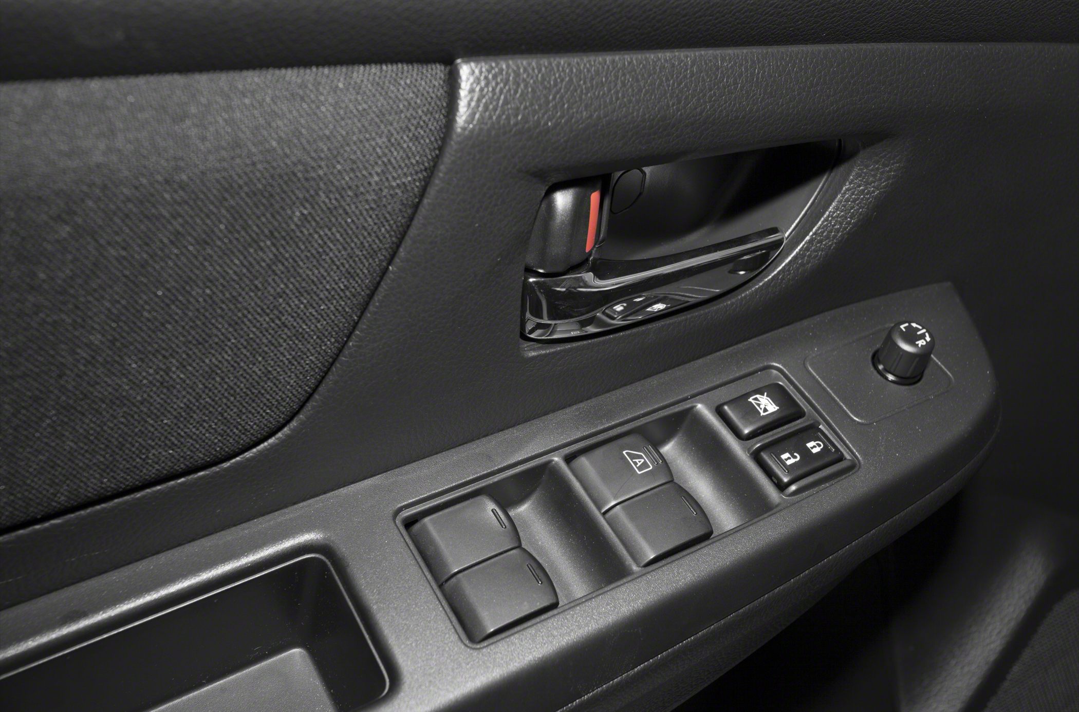 Power window switches, door lock buttons, side mirror adjust knob