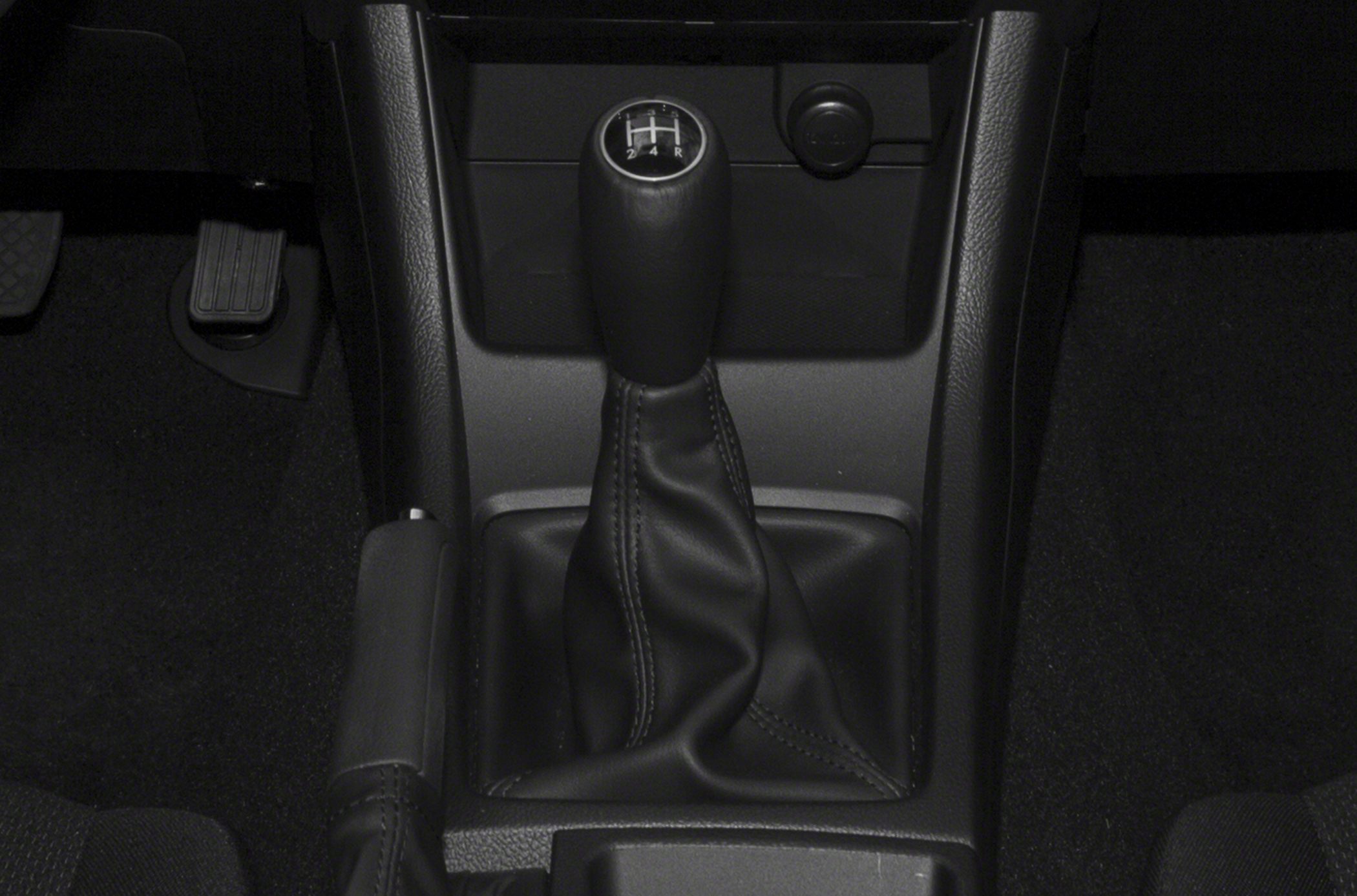 Manual gear shift lever and handbrake in car interior