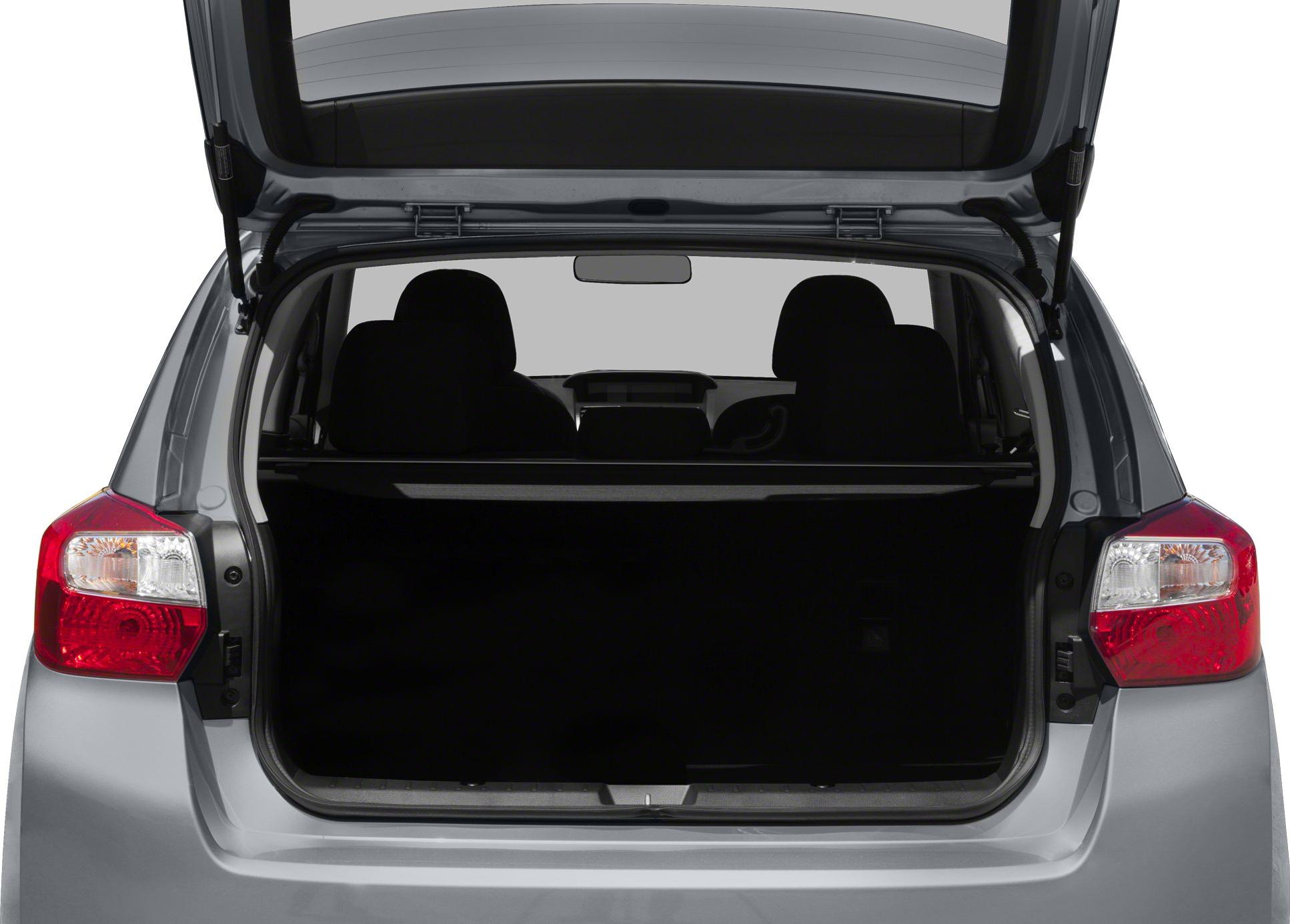 Open rear hatch and spacious trunk area of a hatchback