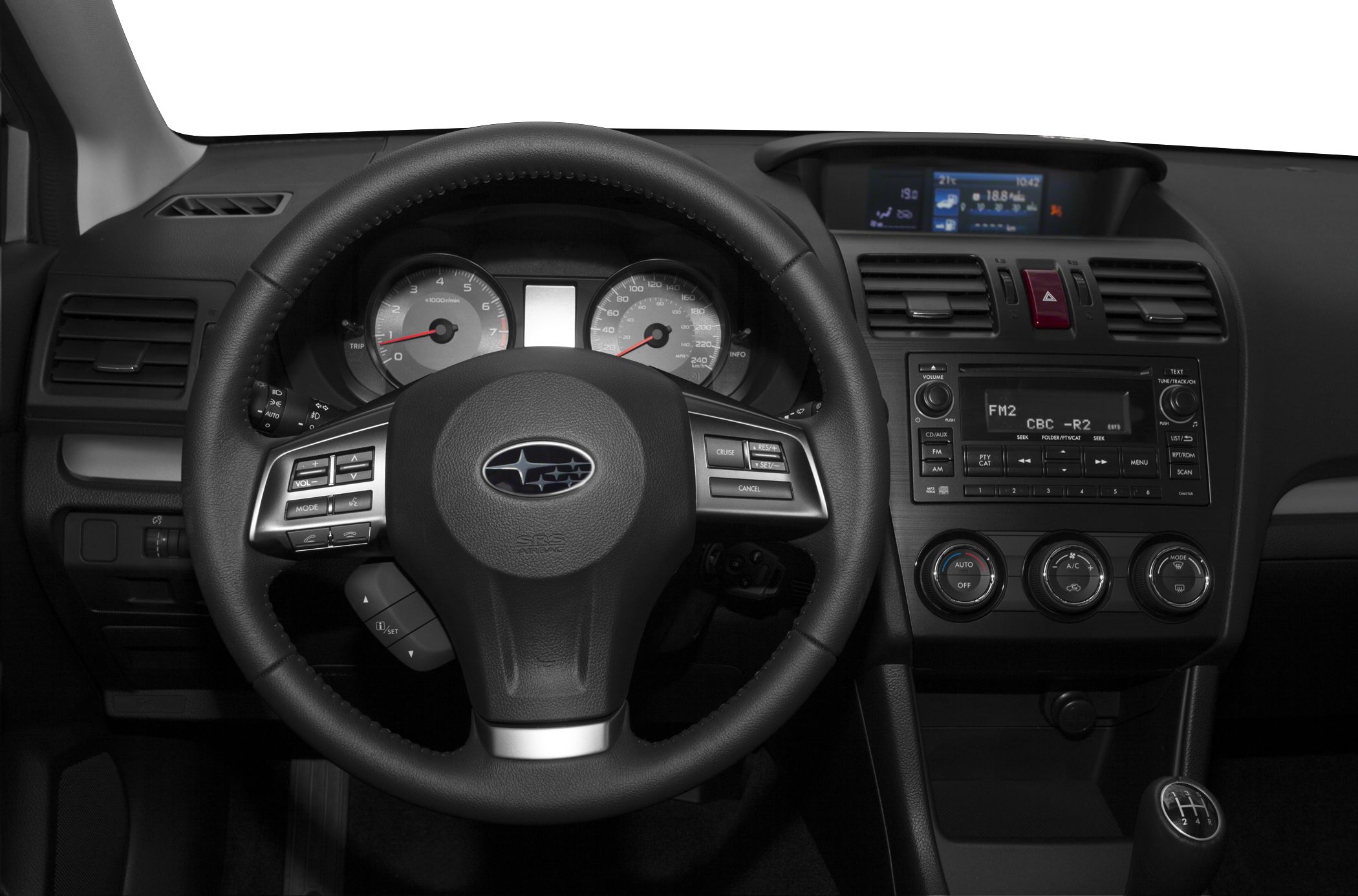 Steering wheel, dashboard with instrument cluster, center console controls