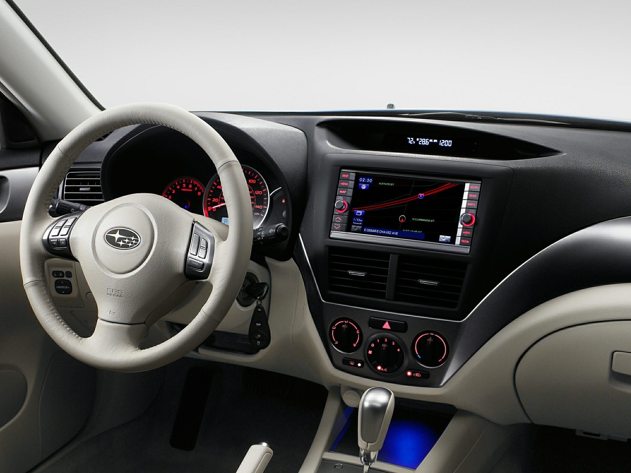 Car interior with dashboard, steering wheel, and navigation screen