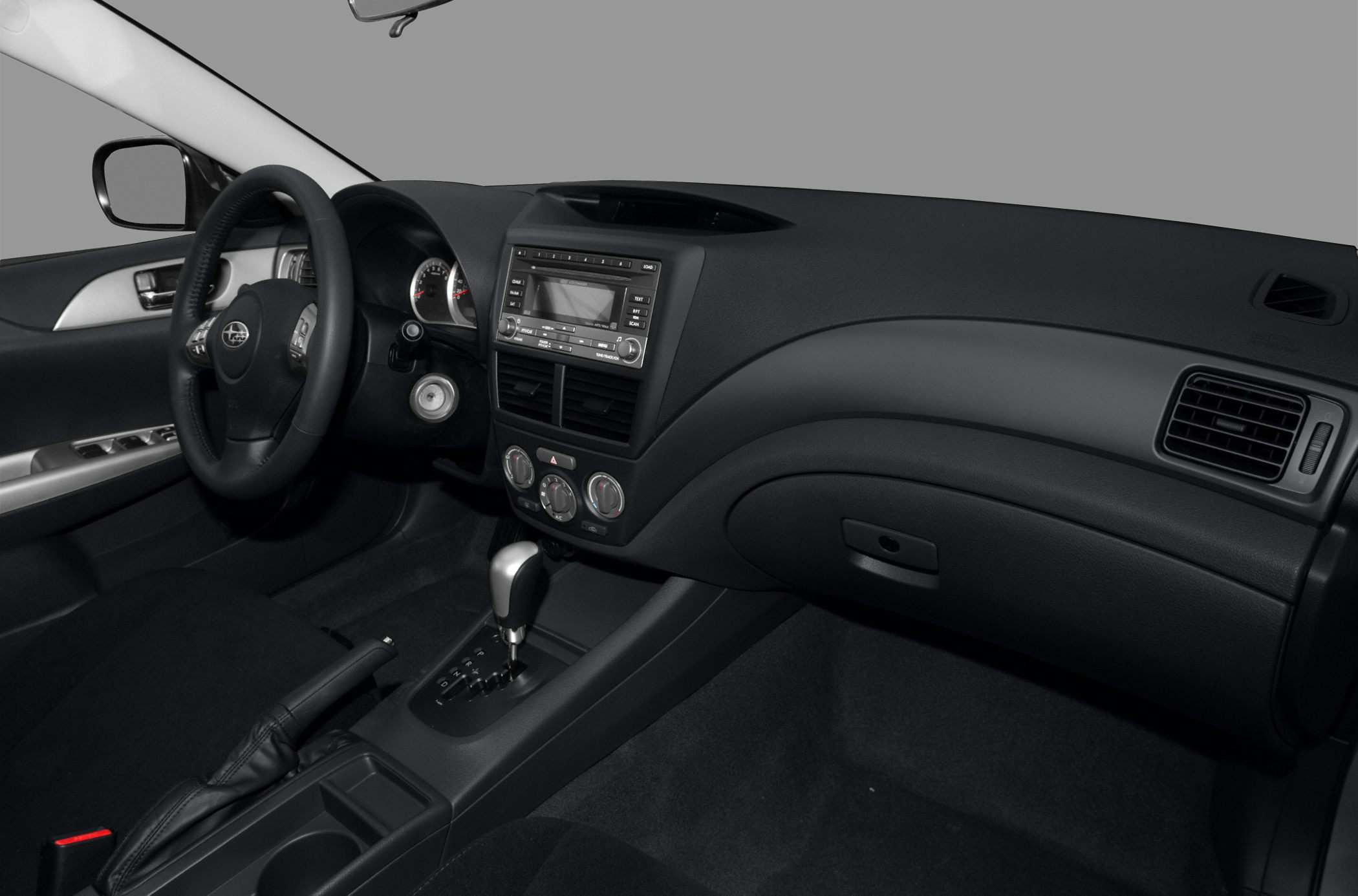 Modern sedan interior with dashboard and automatic gear shift