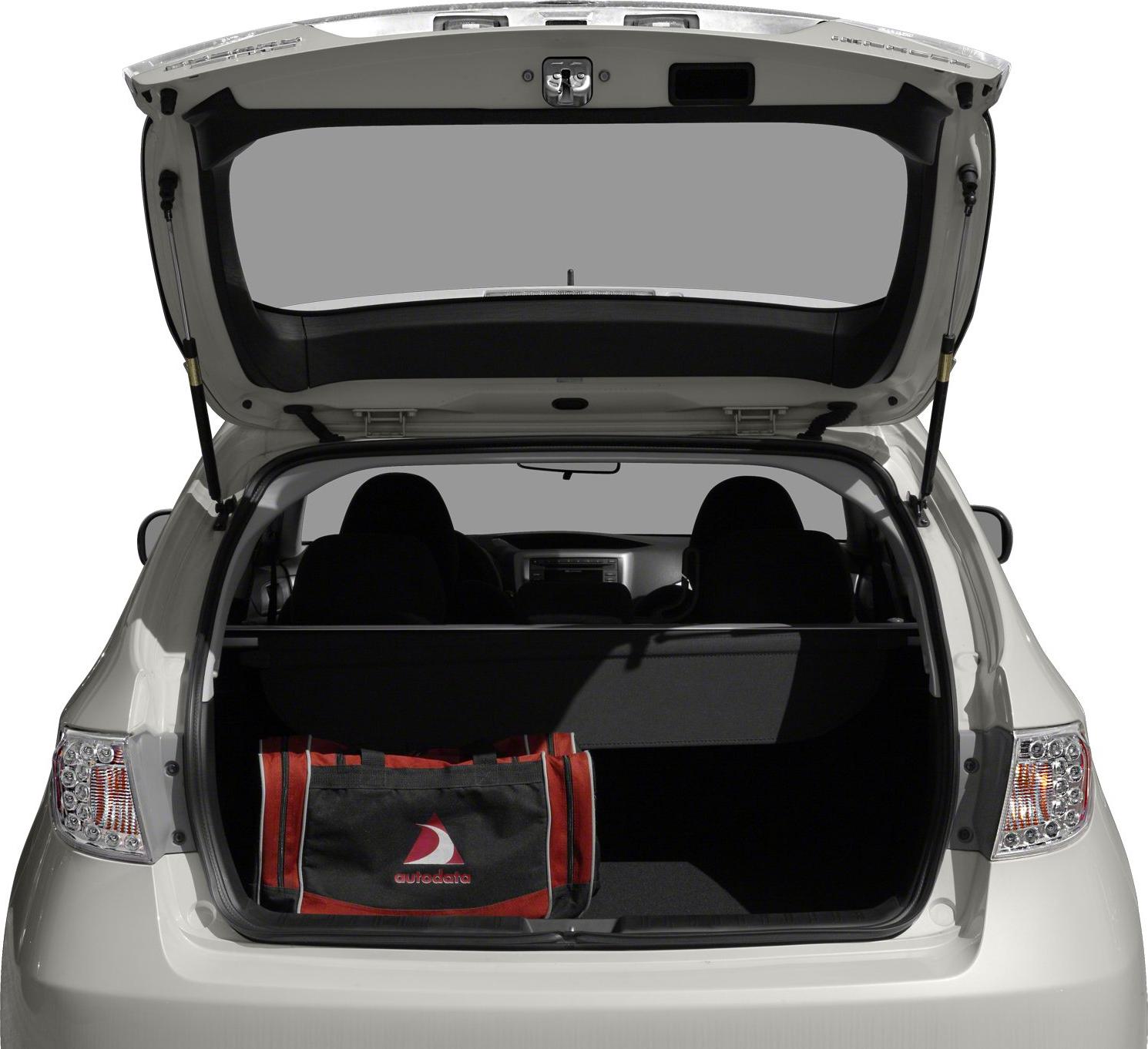 Open hatchback trunk with cargo cover and a bag inside