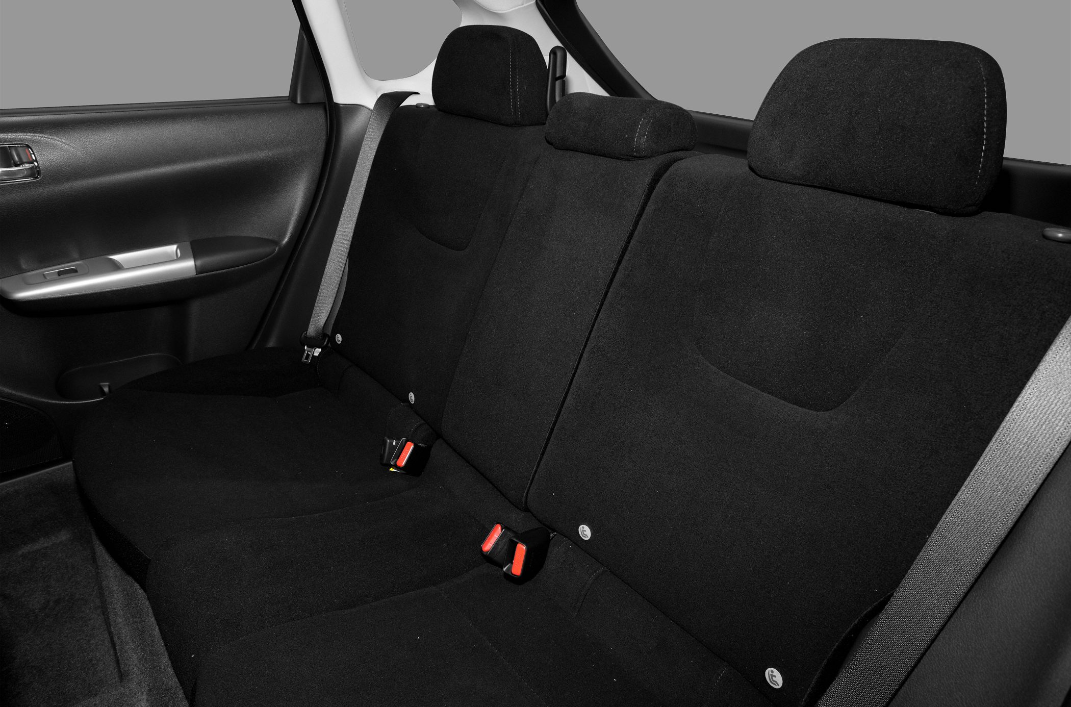 Rear fabric seats with headrests and seatbelts