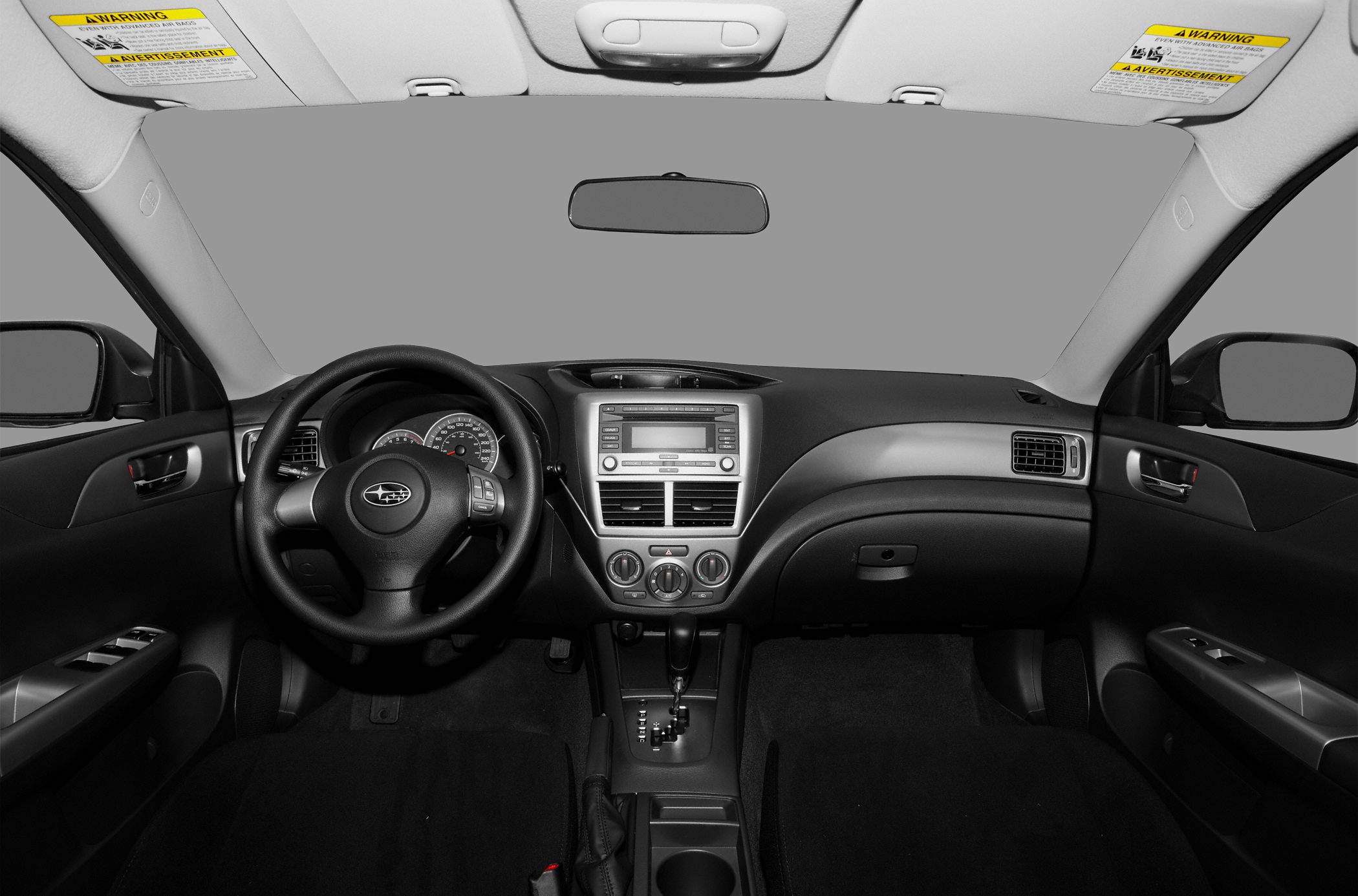 Interior dashboard and steering wheel with central console and gear shifter