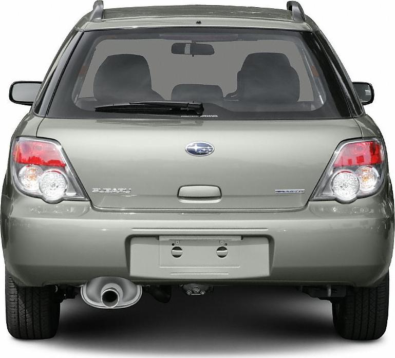 Rear view of station wagon with roof rails and dual circular tail lights