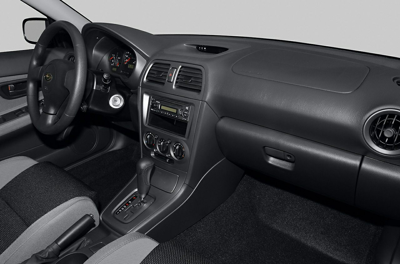 Dashboard, steering wheel, center console, and front seats interior
