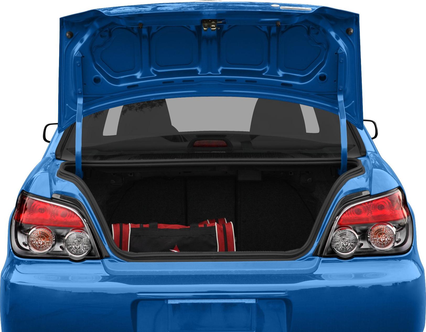 Open trunk with clear rear lights and cargo space with a bag inside.
