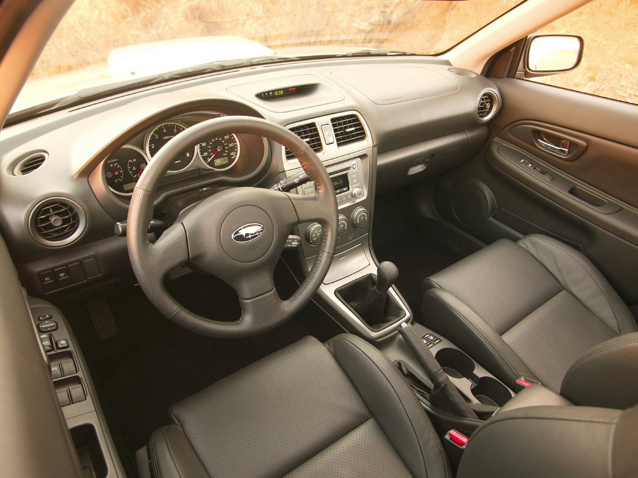 Dashboard and manual transmission interior with leather seats