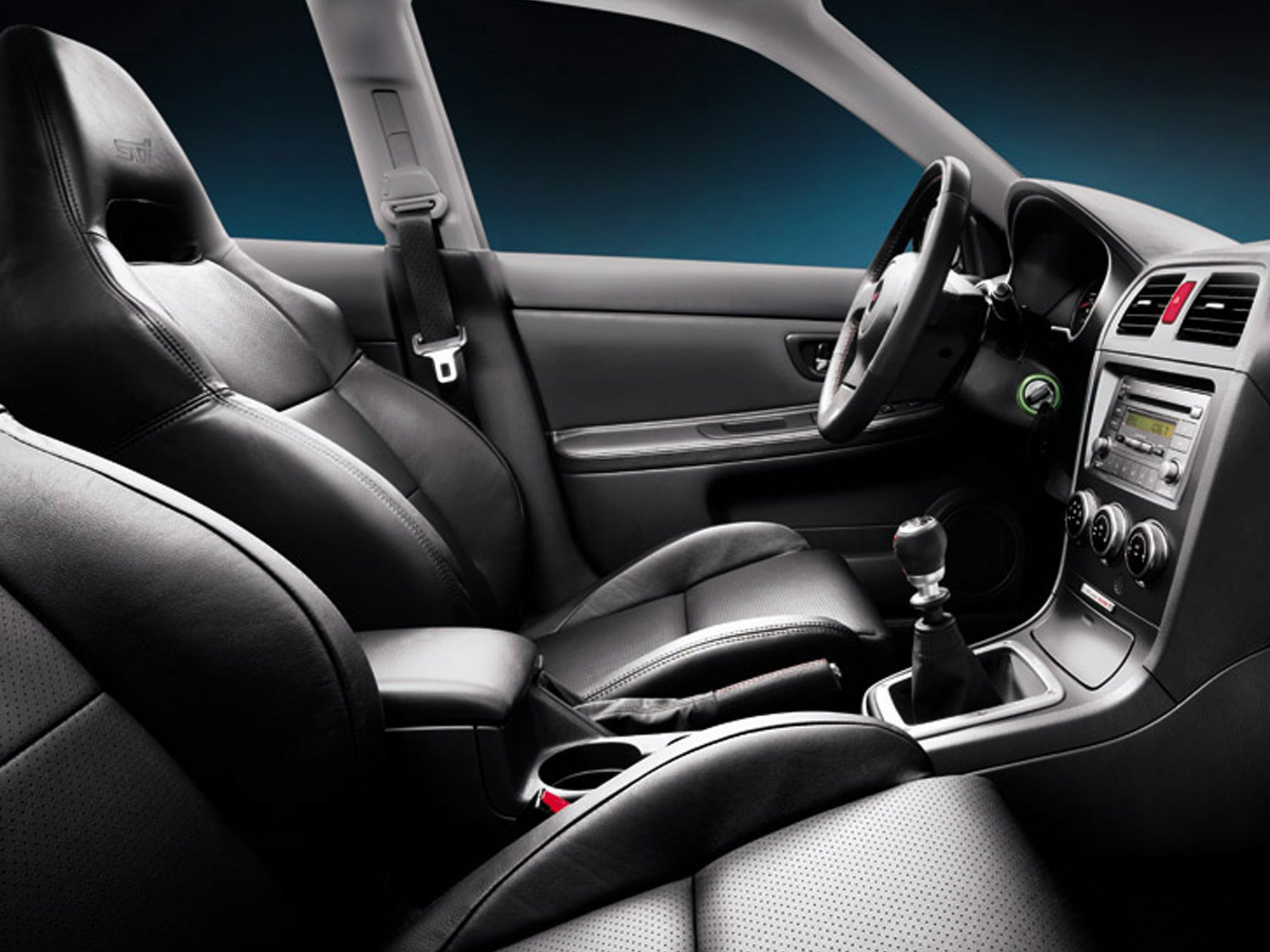 Sporty leather seats and manual gearshift in car interior