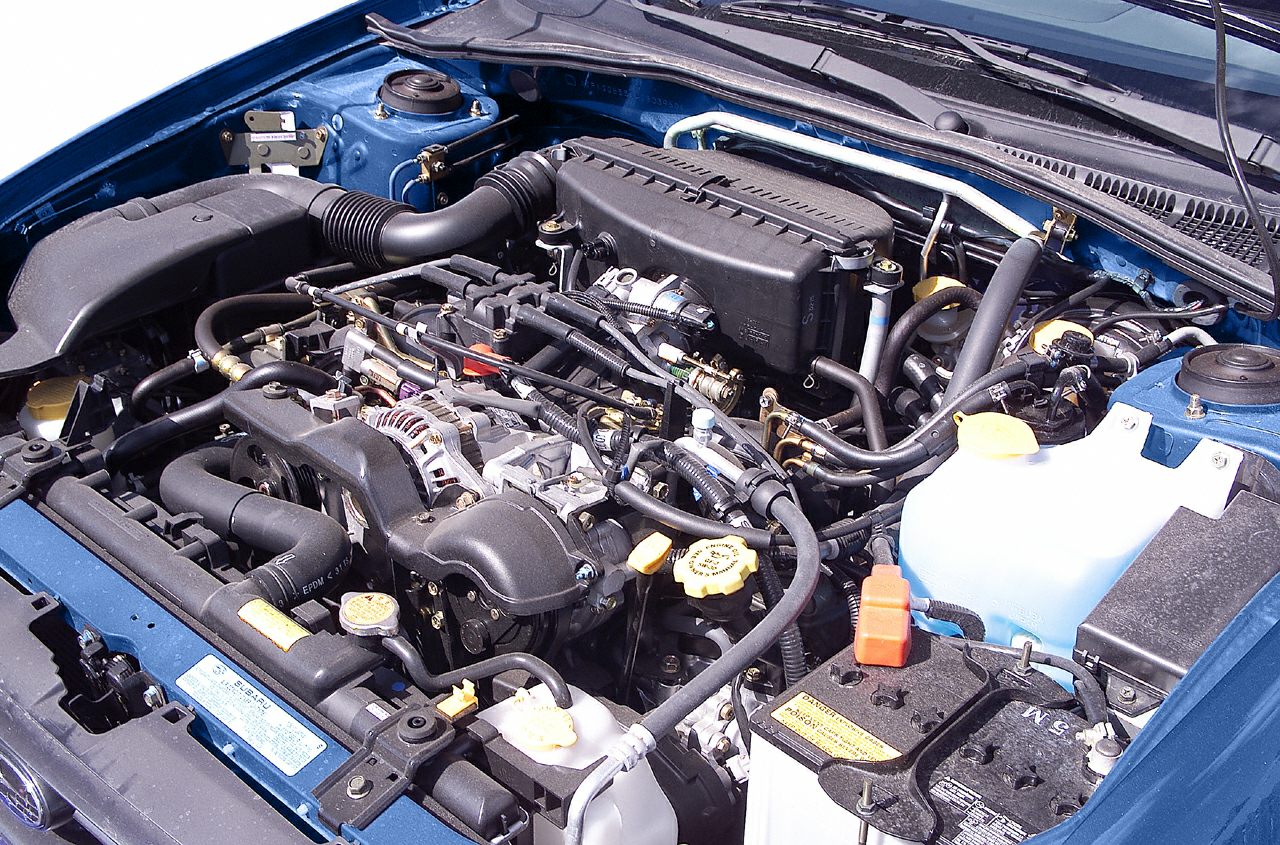 Close-up of detailed engine bay with visible components and wiring