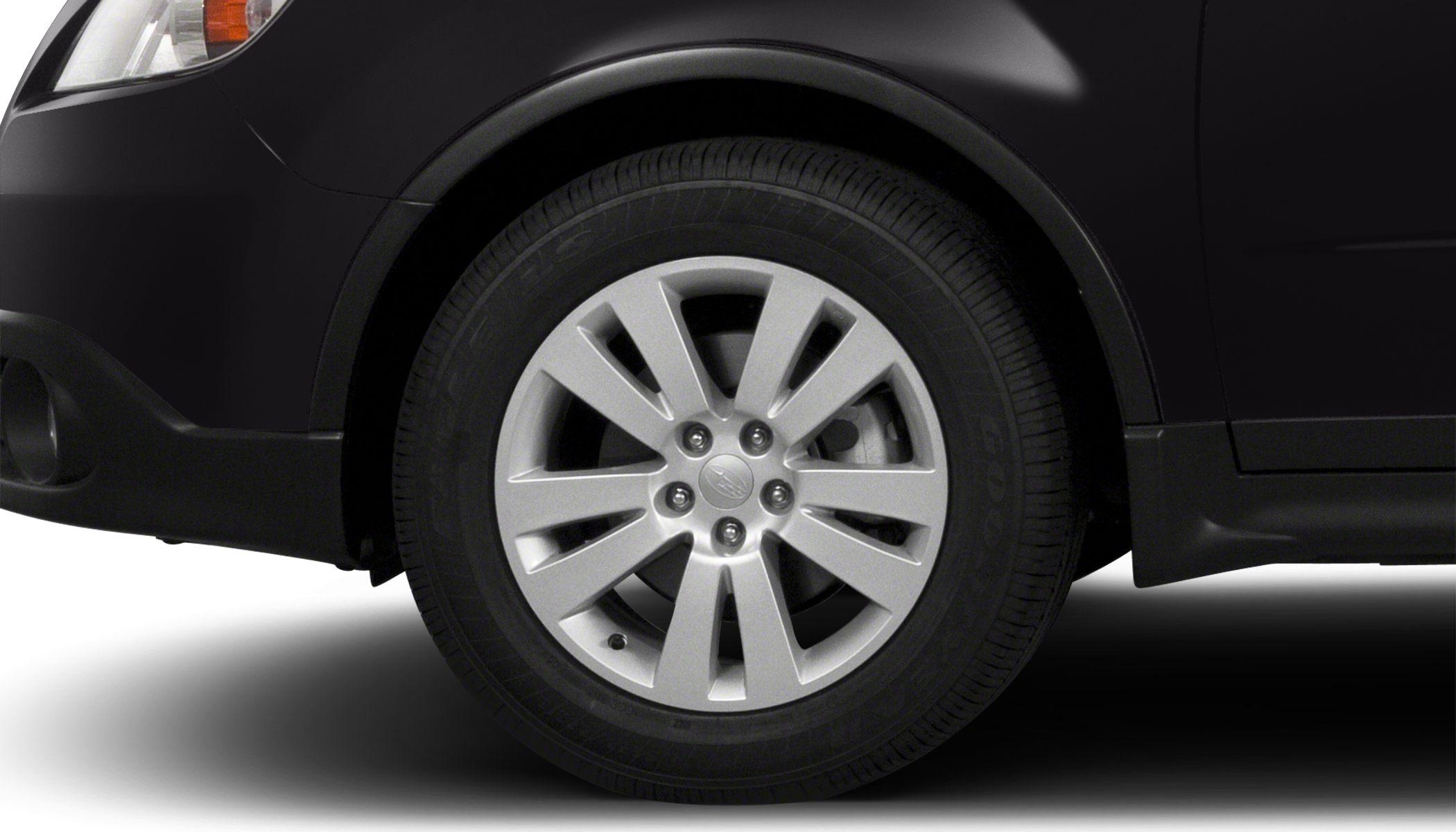 Close-up of alloy wheel and tire on an SUV front section