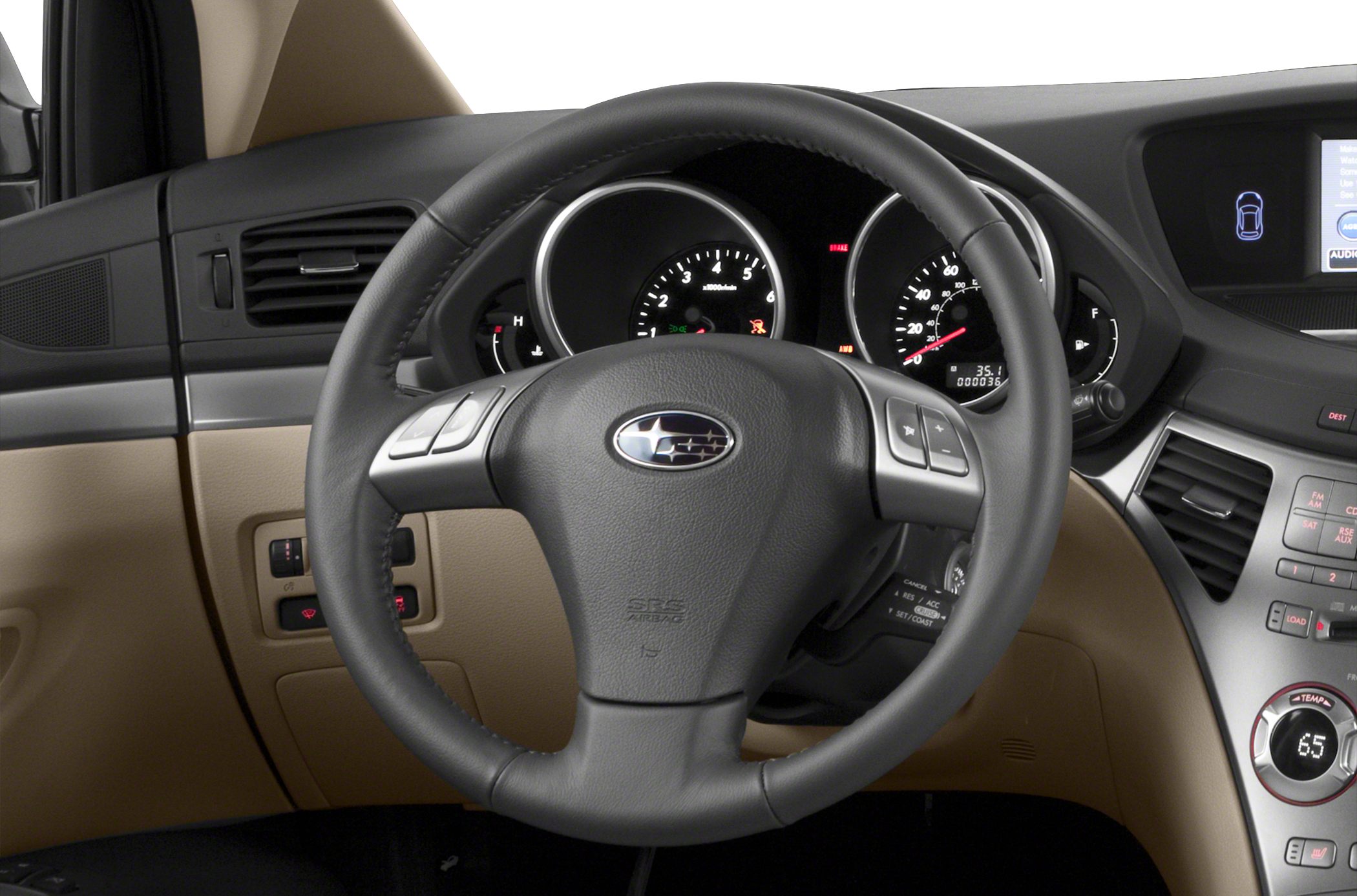 Steering wheel with controls, instrument cluster, dashboard climate and media controls