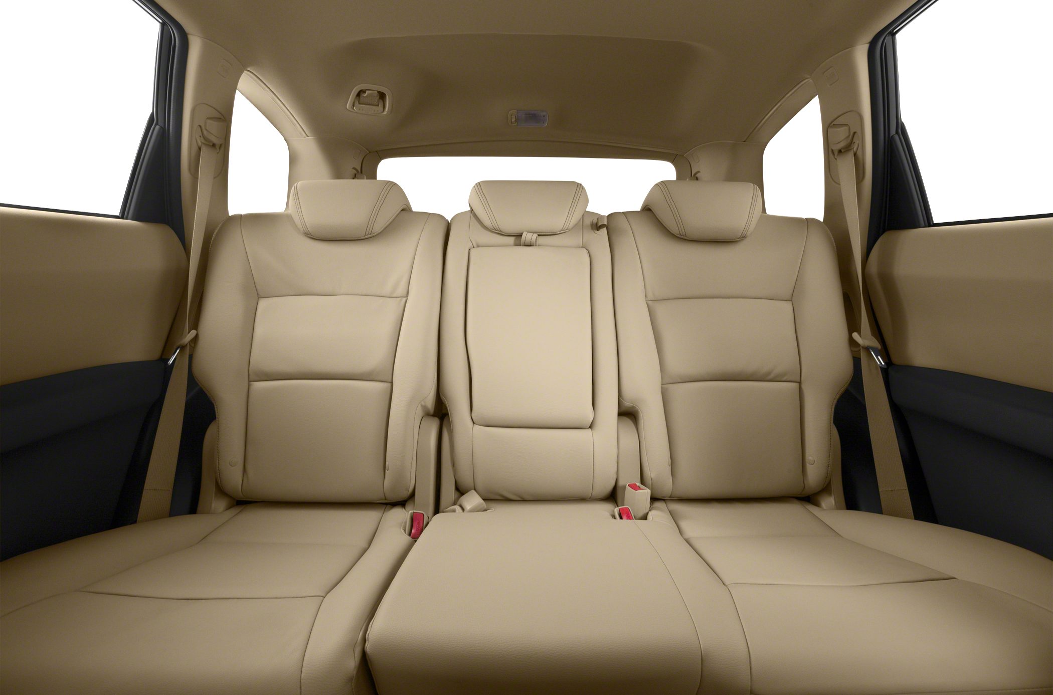 Beige leather rear seats with headrests and seat belts