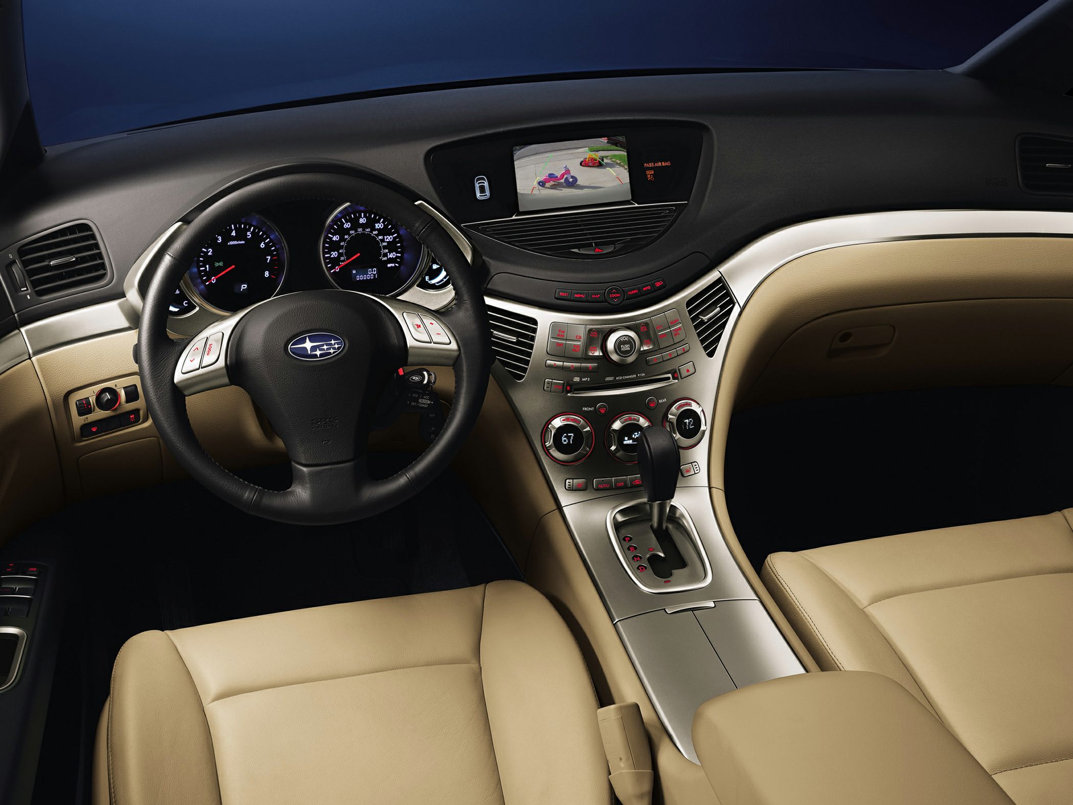 Dashboard with navigation screen and steering wheel controls