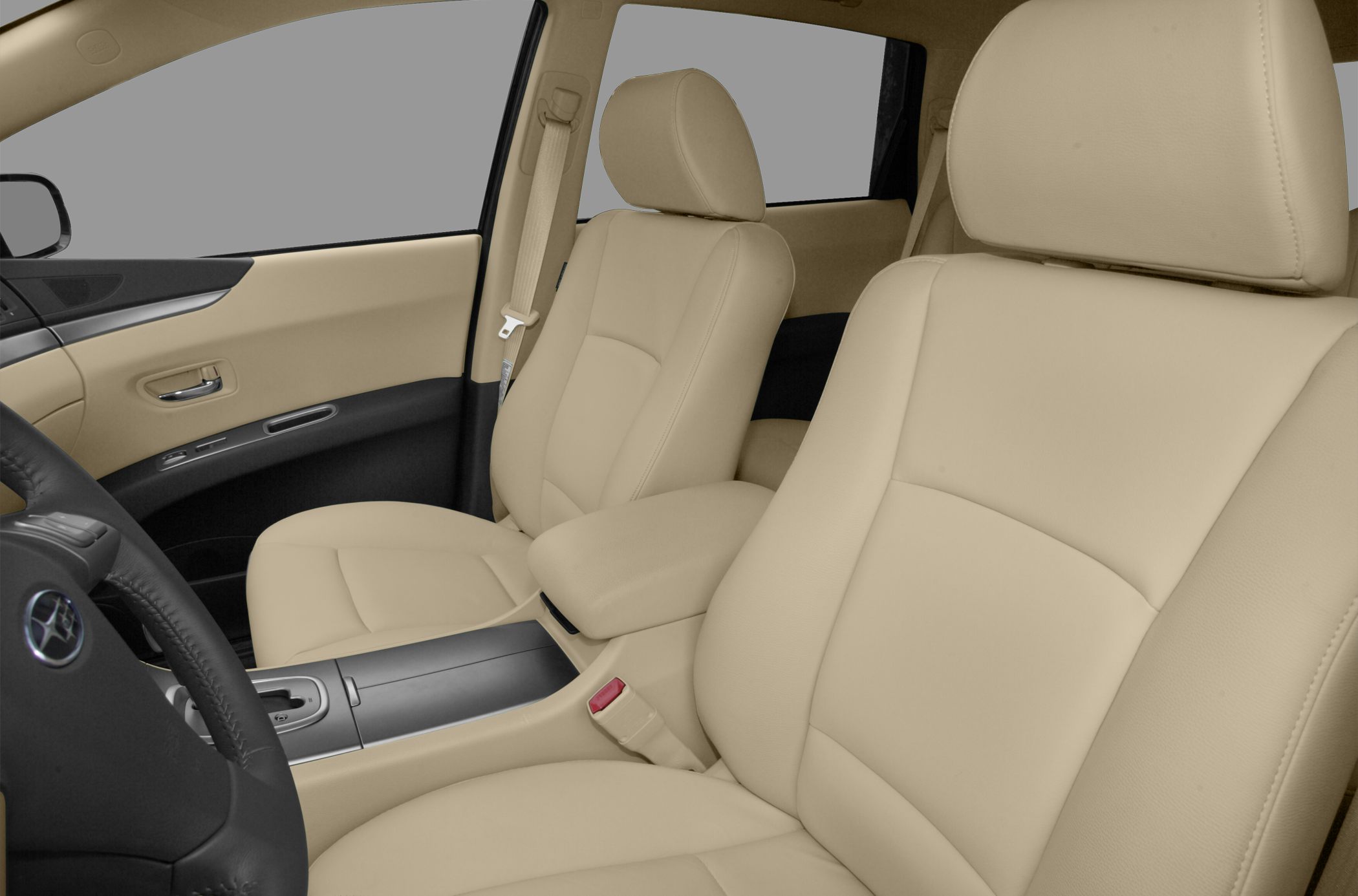 Beige leather front seats with tan interior door panel