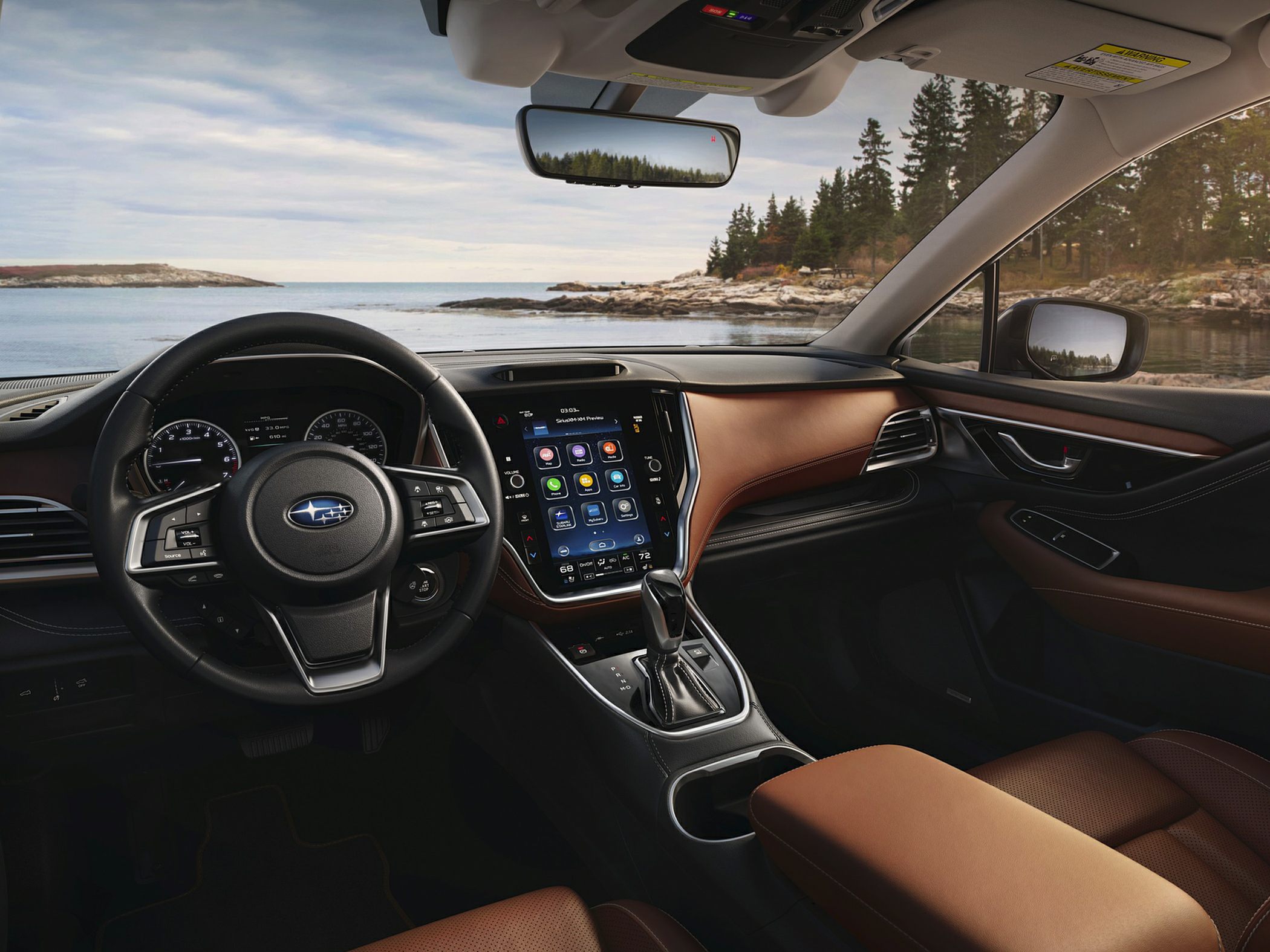 Modern touchscreen infotainment and multifunction steering wheel controls