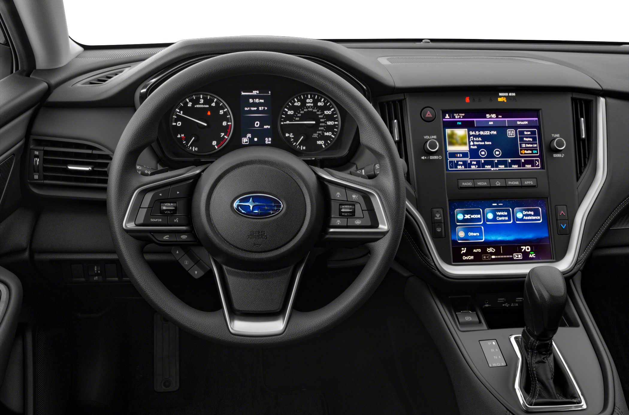 Dashboard, dual touchscreen infotainment, steering wheel, gear shift