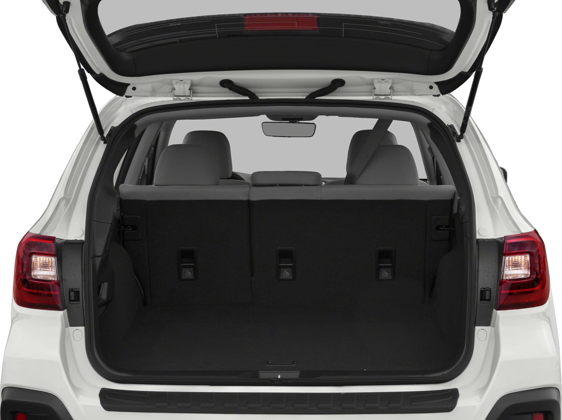 Spacious rear cargo area with upright seats and open hatch