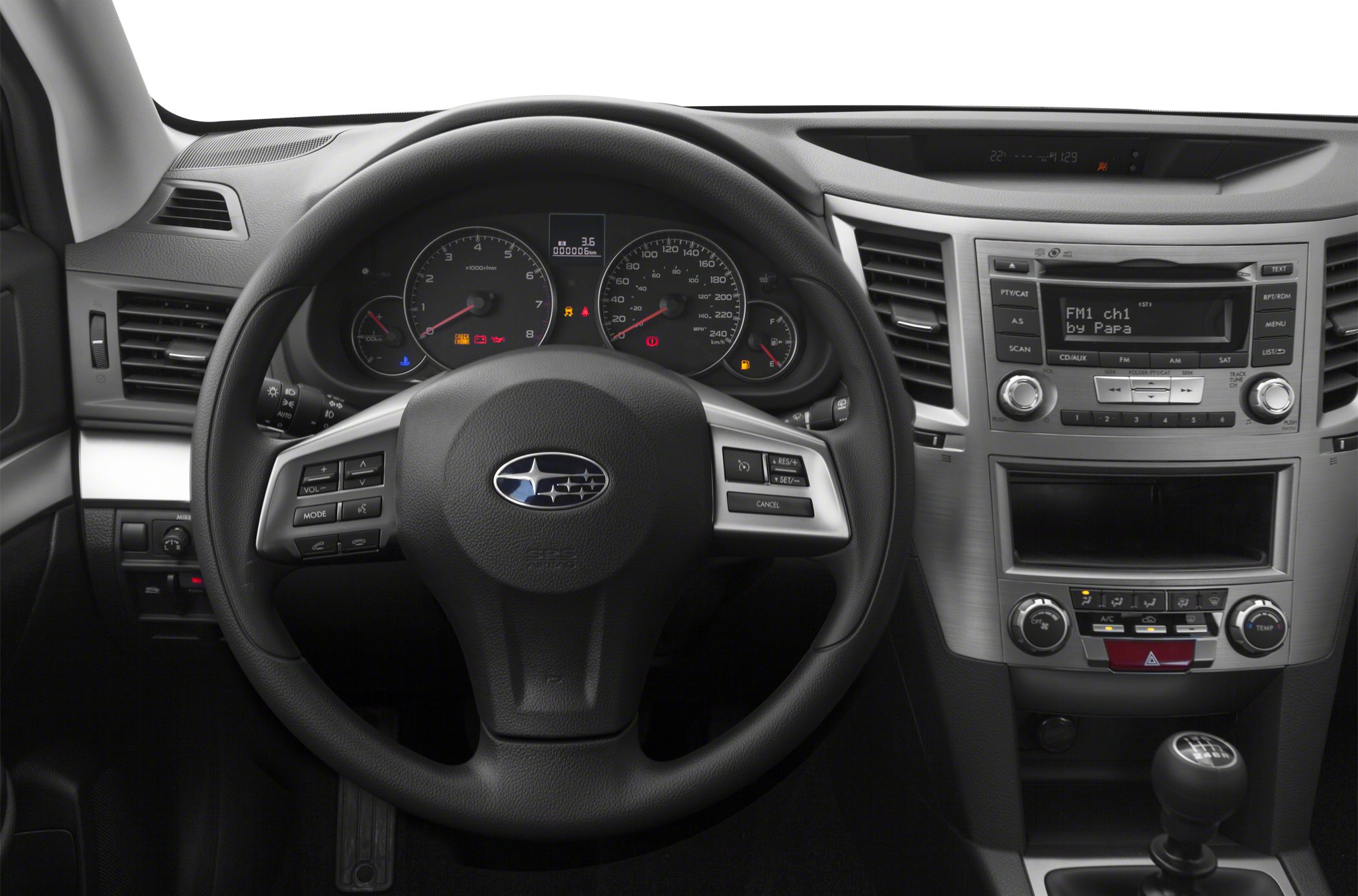 Steering wheel, dashboard, manual gear stick, and control panel
