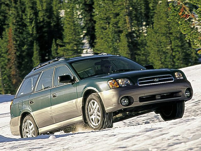 All-wheel drive wagon driving on snowy terrain