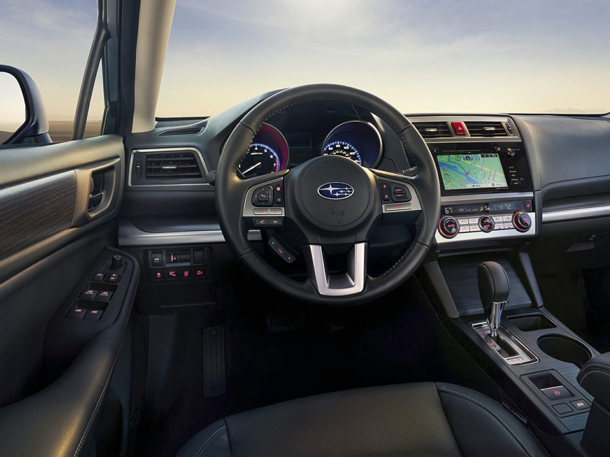 Dashboard with navigation touchscreen and multifunction steering wheel