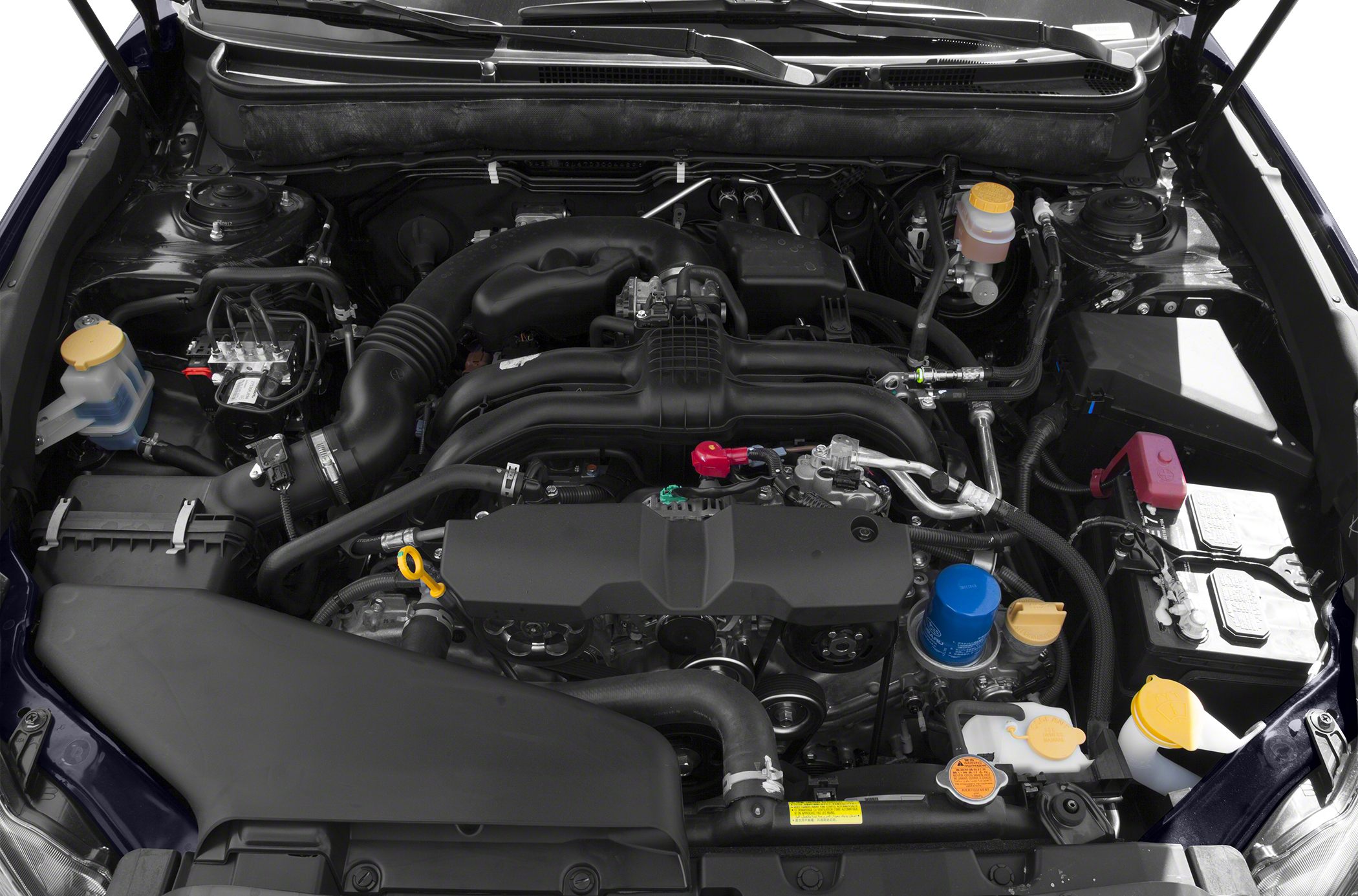 Close-up view of a car's engine bay showcasing engine components and layout