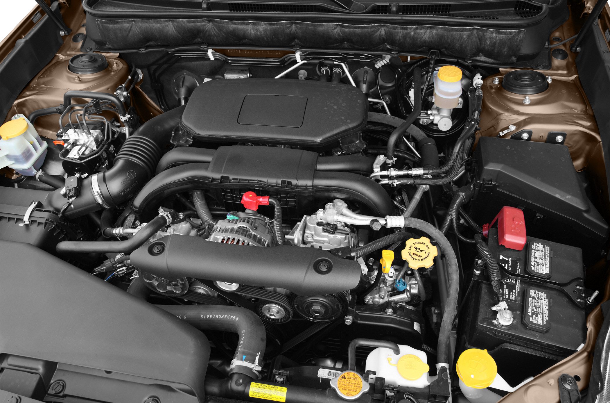 Horizontal boxer engine layout with visible battery and fluid reservoirs