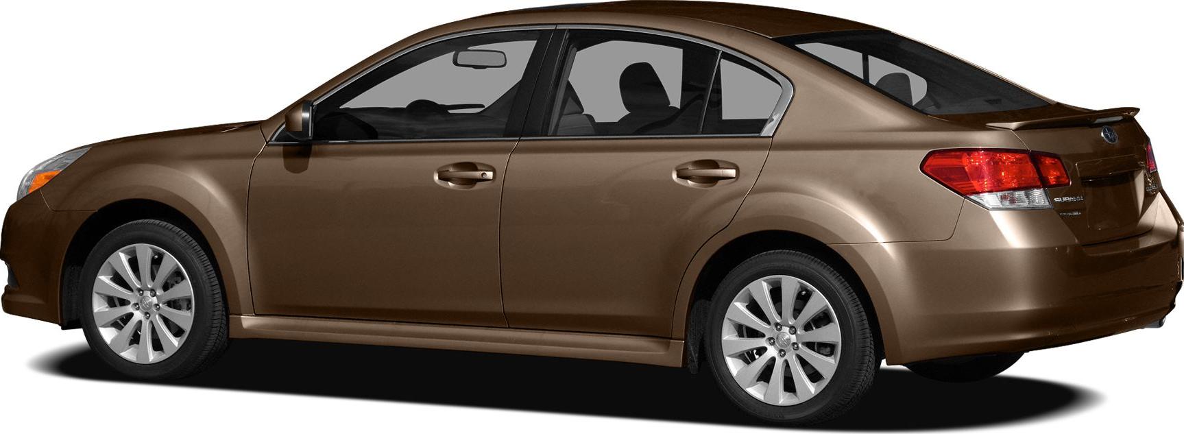 Side profile of a sedan with rear spoiler and alloy wheels