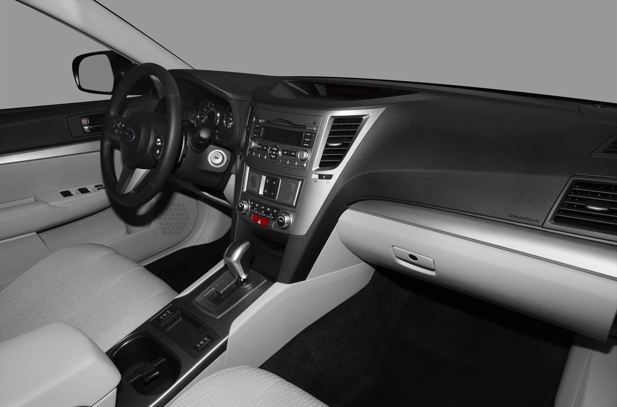Modern car interior dashboard and steering wheel with center console