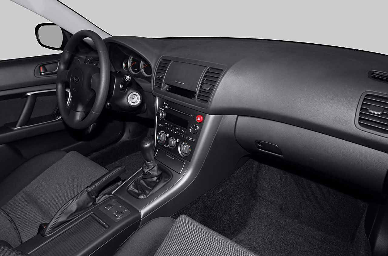 Interior dashboard and center console with steering wheel and gear shift