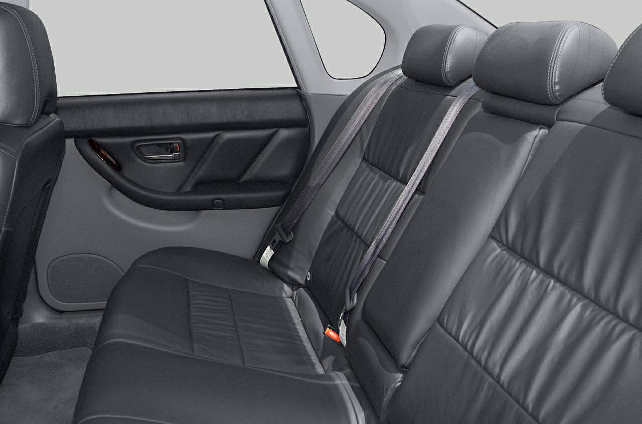 Rear leather seats with headrests and seatbelts