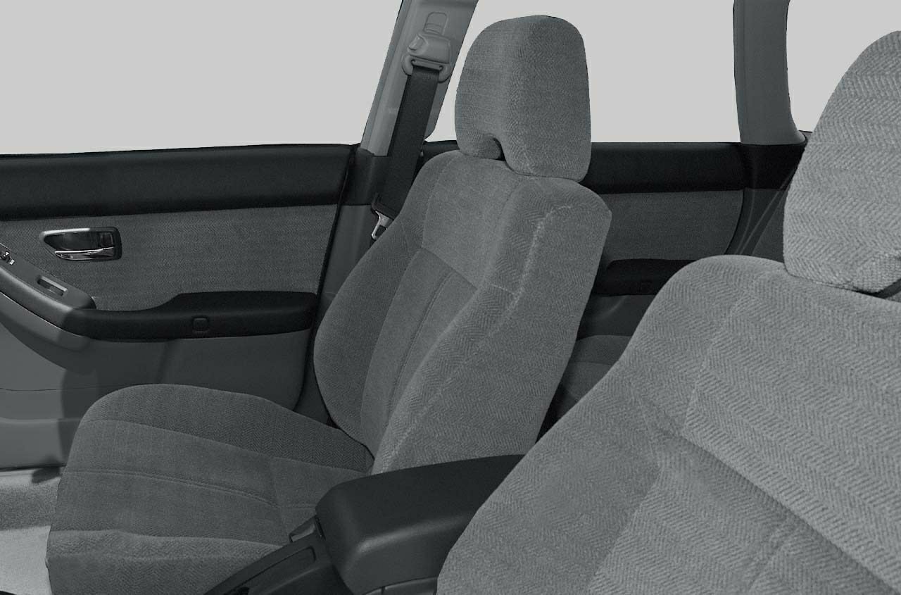 Front seats and door panel with fabric upholstery and seatbelt.