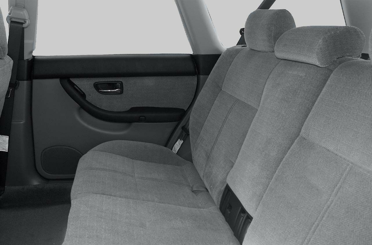 Rear seat with fabric upholstery and door panel in station wagon