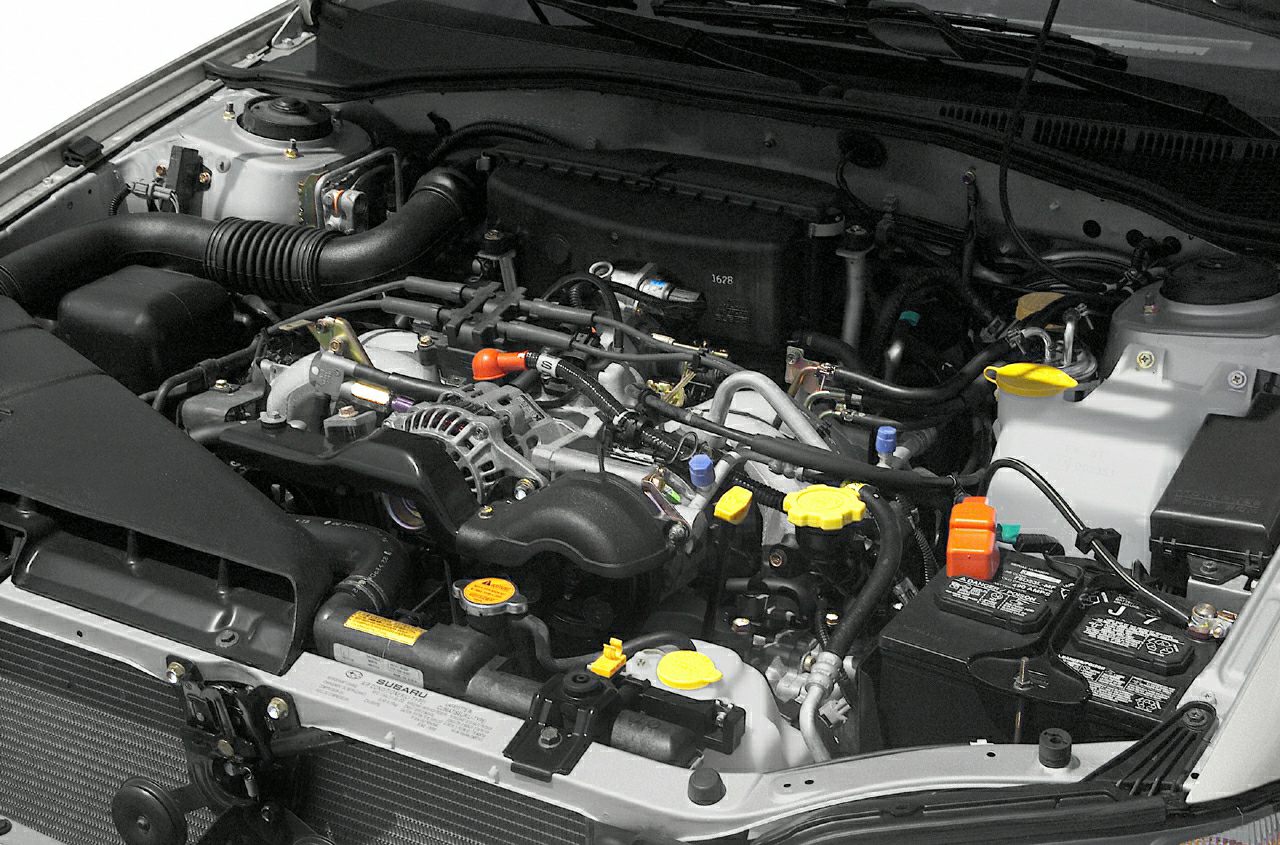 Subaru Legacy III facelift engine bay with visible components and layout