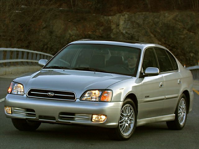 Front sedan view with alloy wheels and fog lights
