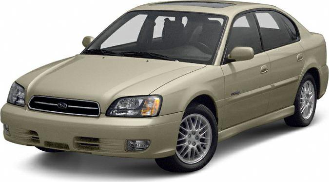Front angle exterior view of a beige mid-size sedan with alloy wheels