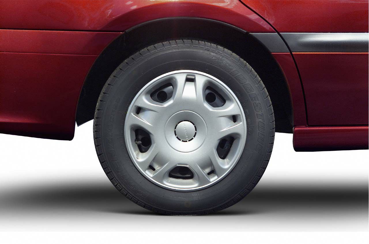 Close-up of alloy wheel and tire on vehicle side