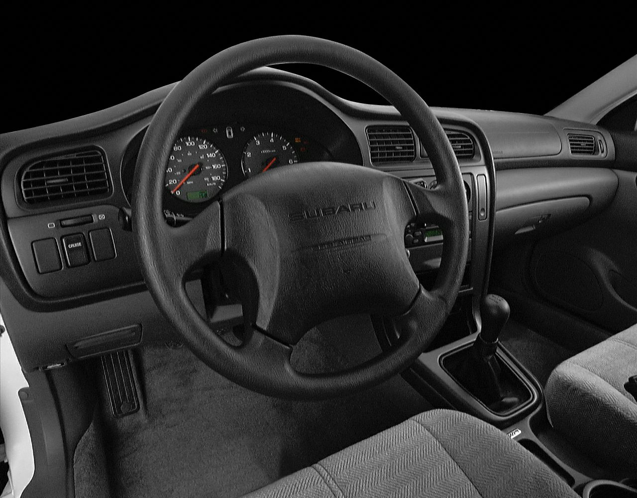 Steering wheel, dashboard, and manual transmission of a classic car interior