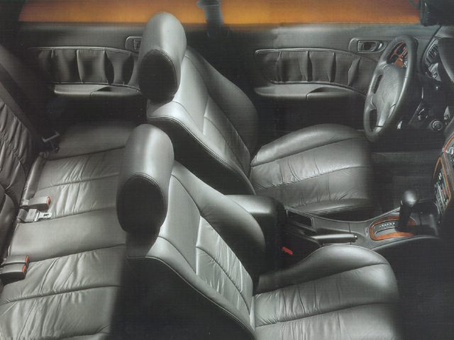 Leather seats, door panels, driver and passenger seating layout
