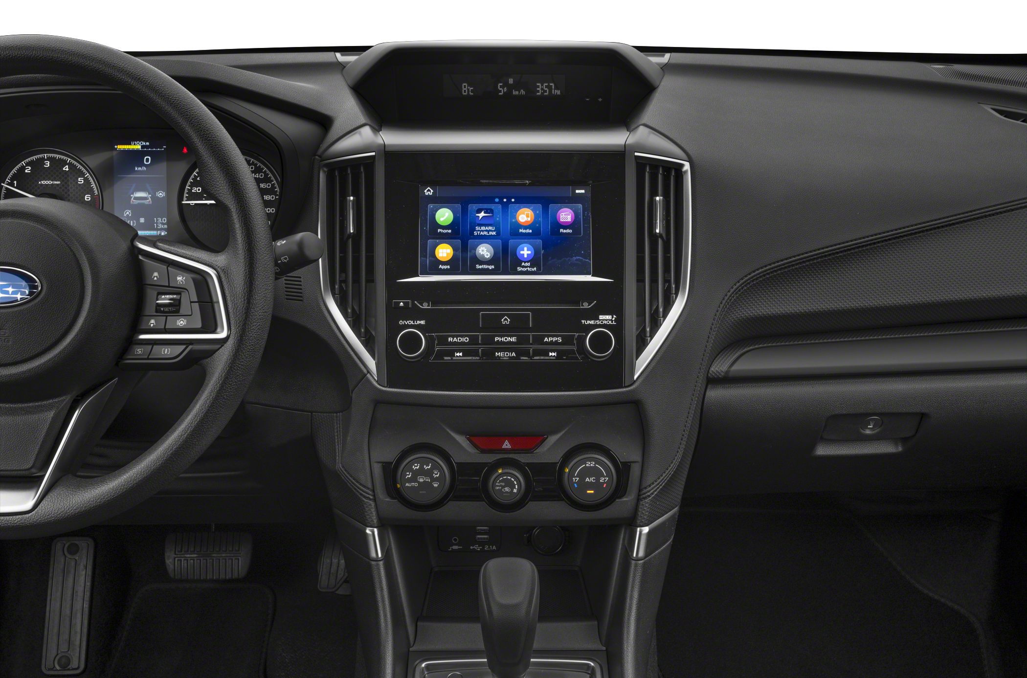 Touchscreen infotainment system and climate control dials in vehicle interior
