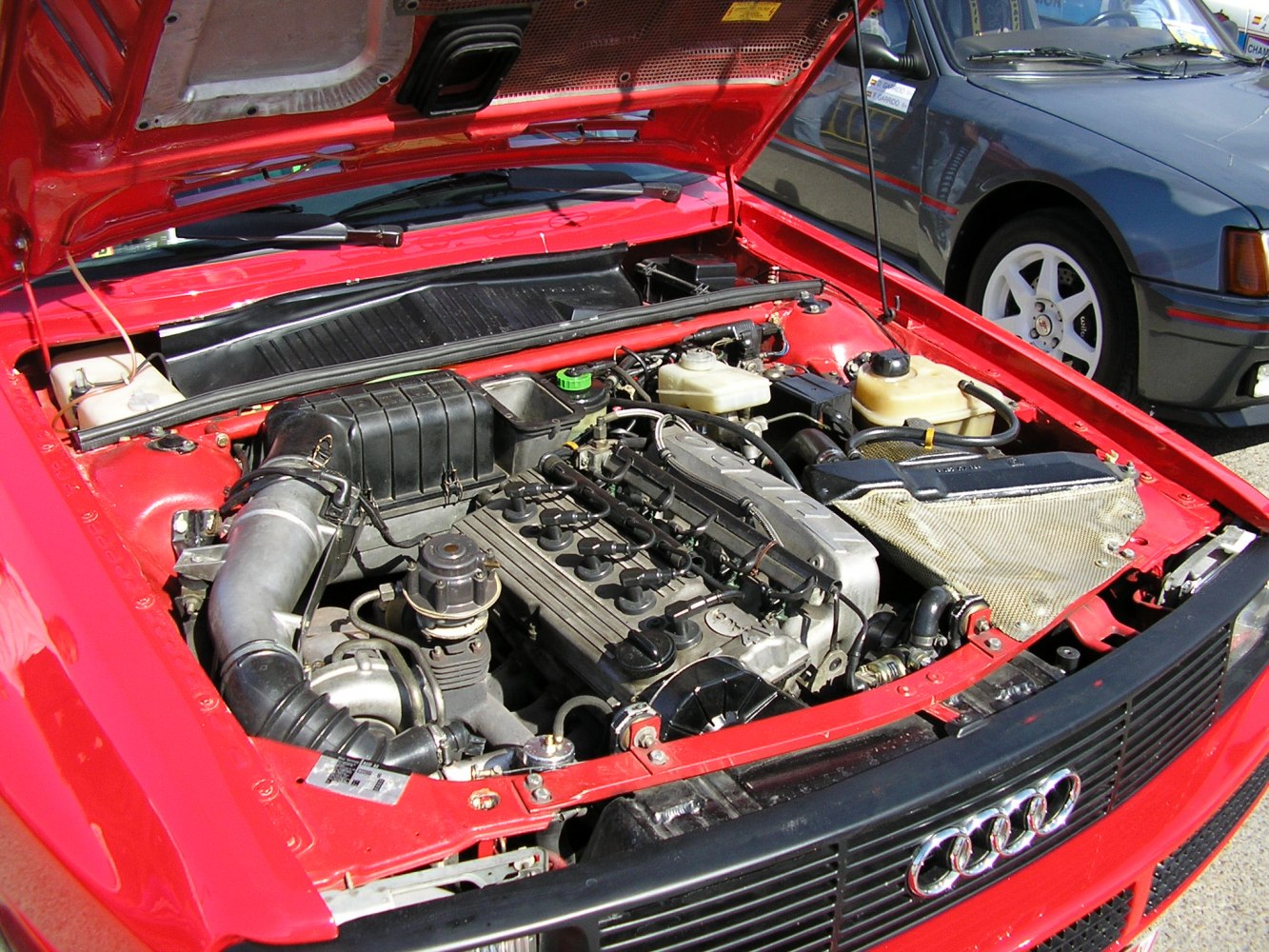 Classic turbocharged engine bay with air intake and components