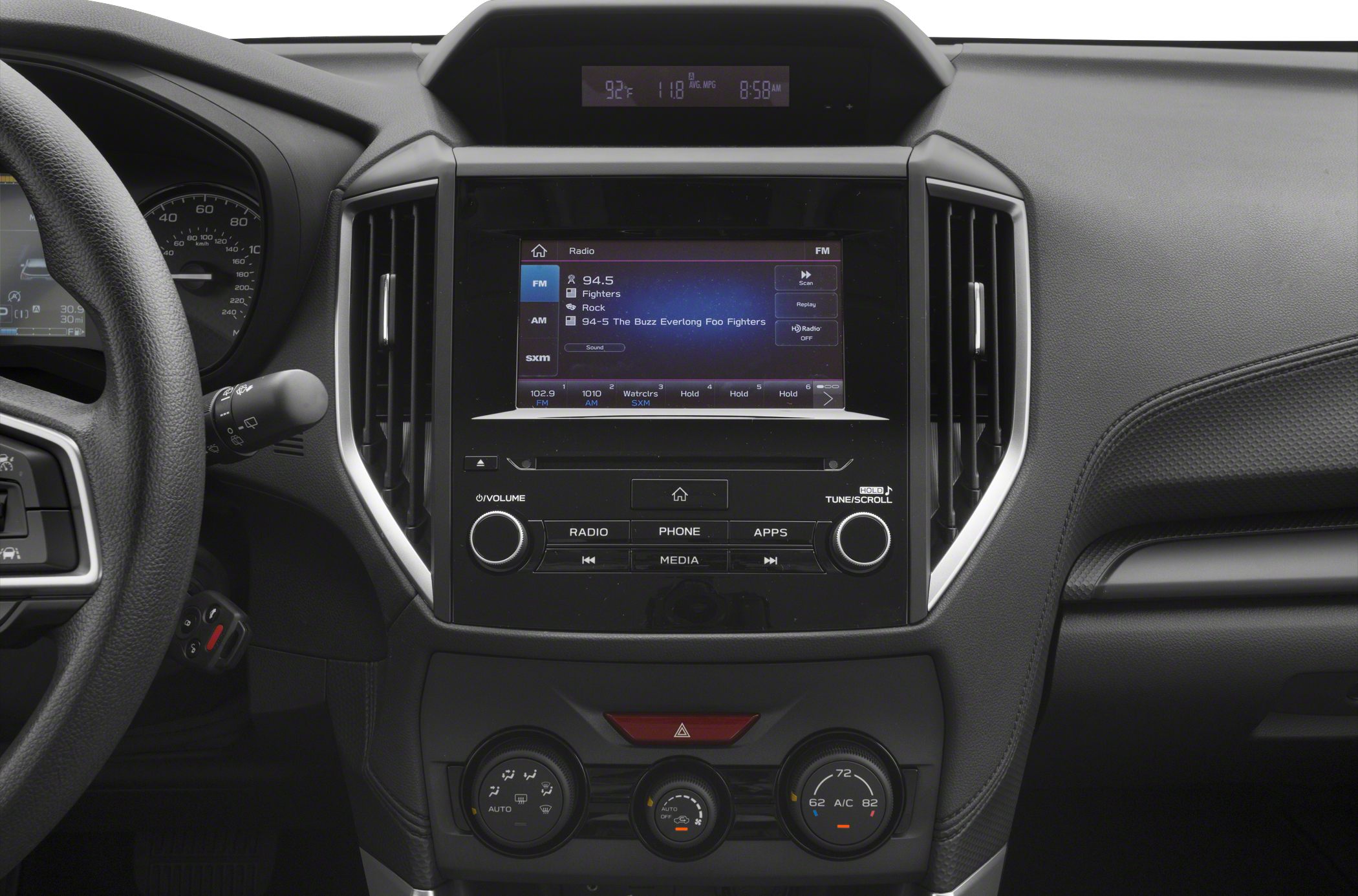 Central infotainment screen with climate control knobs