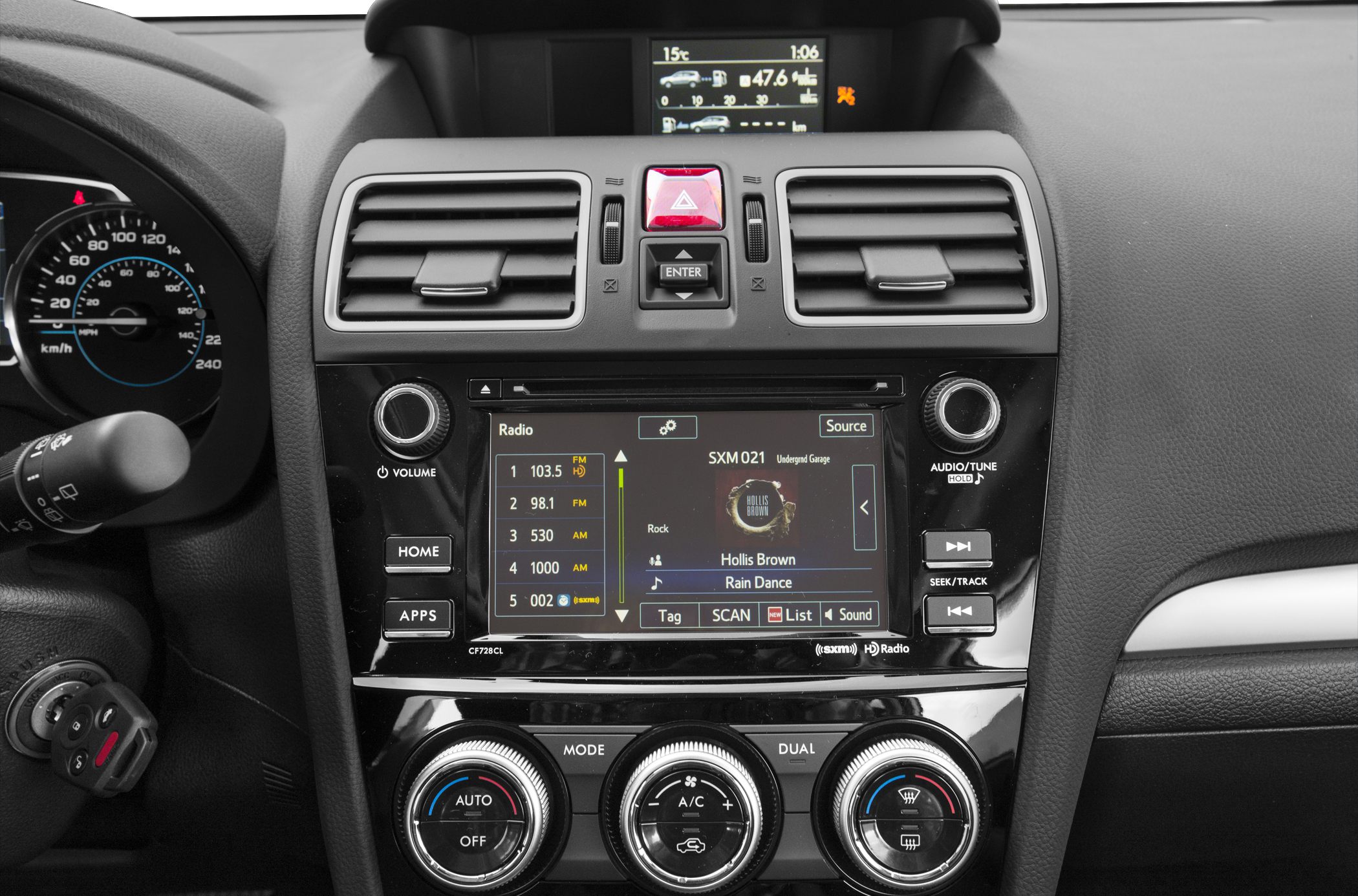 Center console with multimedia system, radio, and climate controls