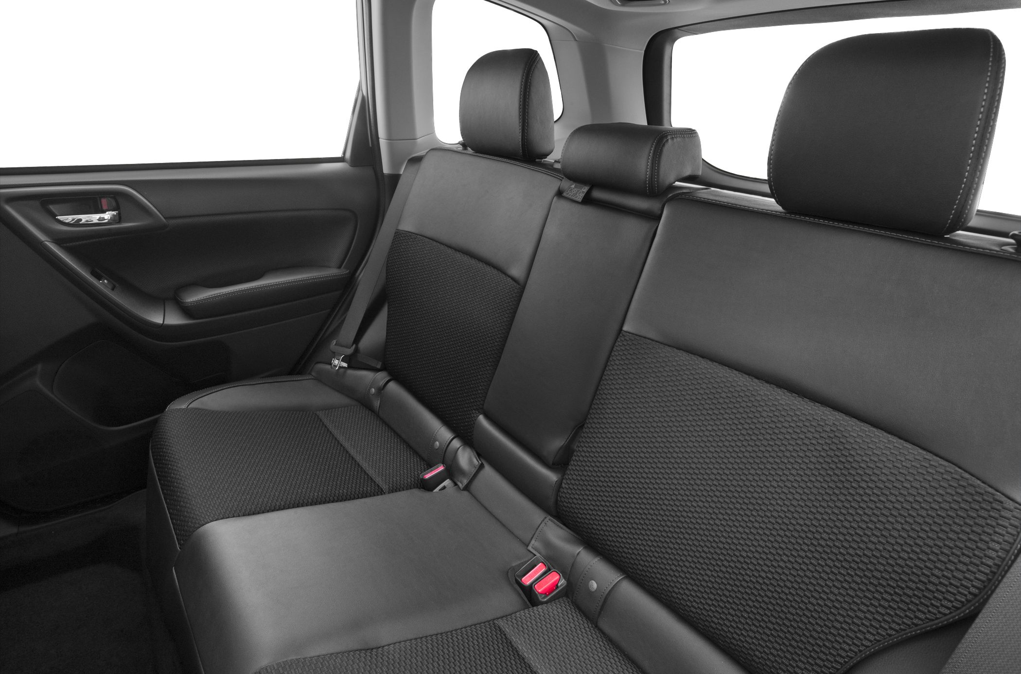 Rear seat interior with black upholstery and seatbelts