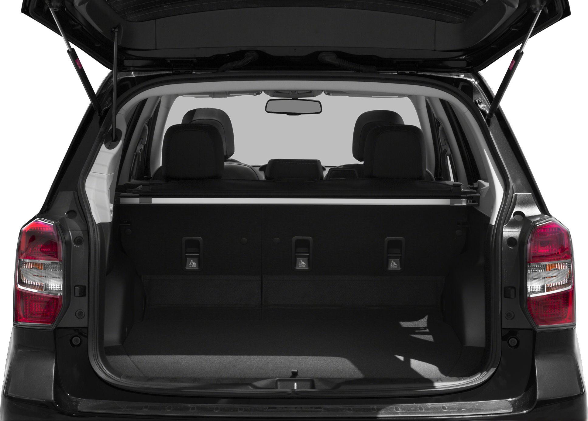 Open rear cargo area with retractable cover and spacious trunk space.