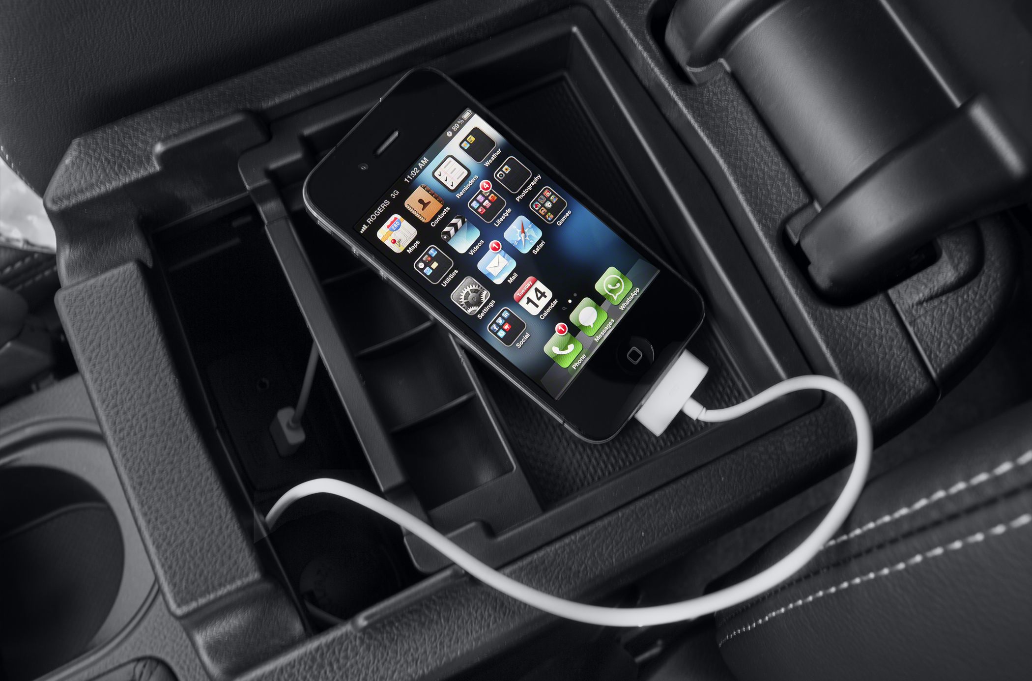 Car center console with phone charging and storage compartments