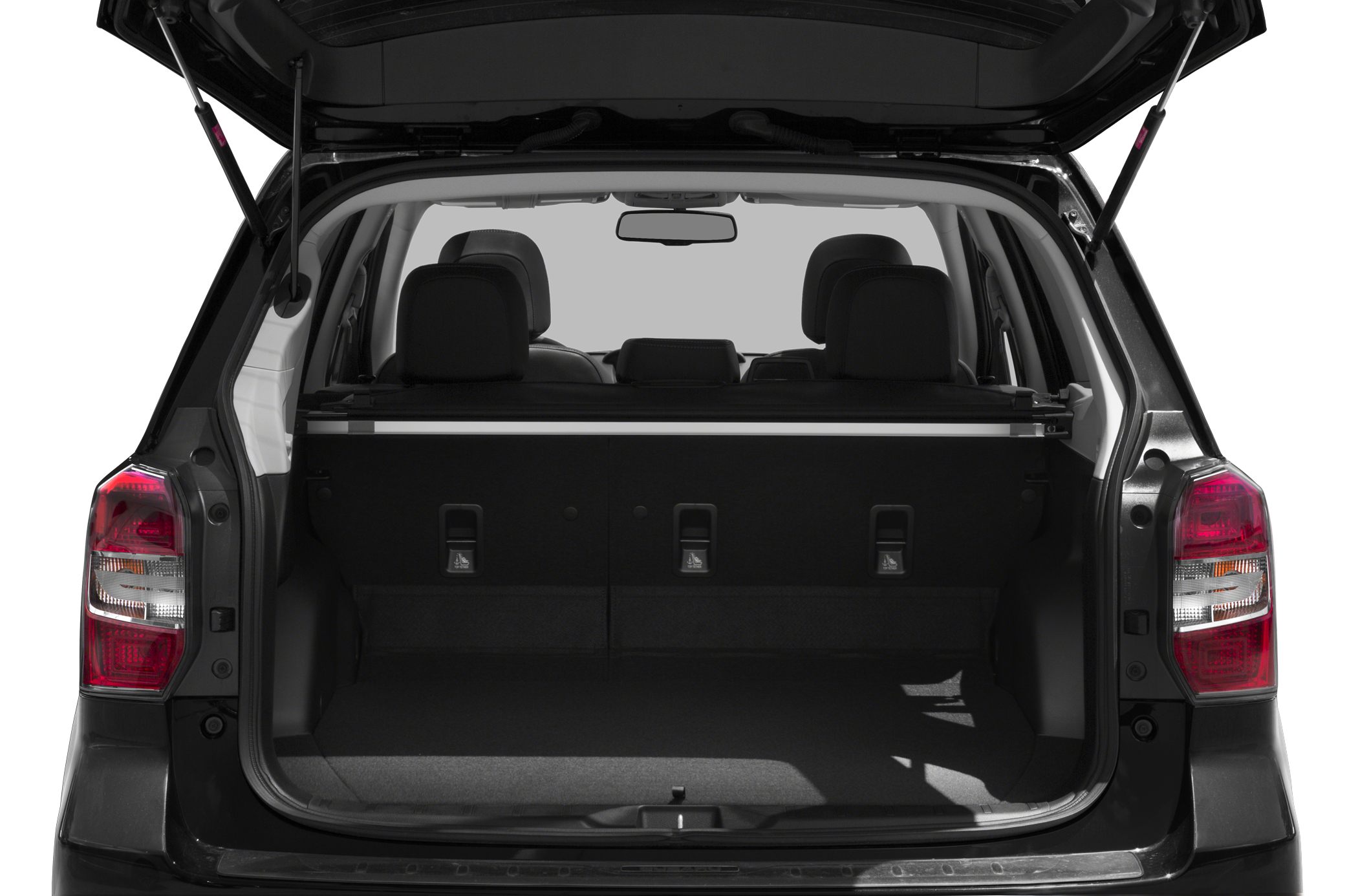 Spacious rear cargo area with open tailgate and visible backseats.