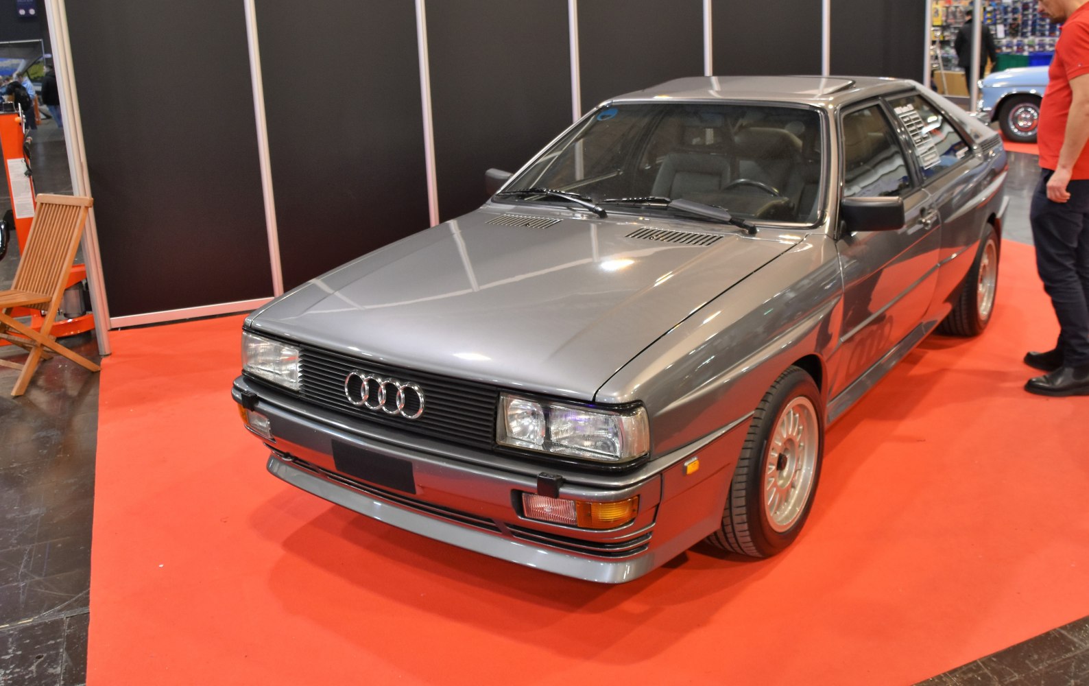 Angular classic sports coupe with distinctive front grille and alloy wheels